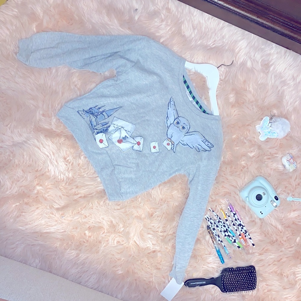 I am selling a gray long sleeve Harry Potter sweater